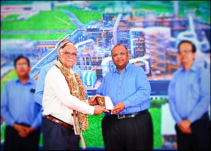 Appreciation Plaque being Received.